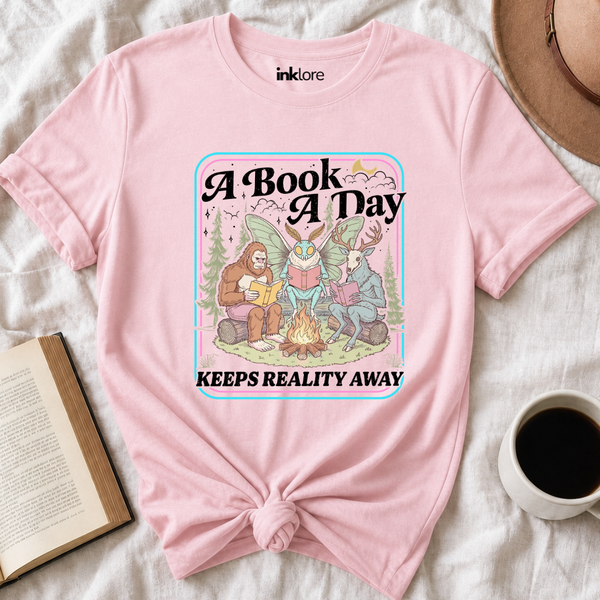 "A Book A Day Keeps Reality Away" T-Shirt | Cryptid Campfire Book Lover Graphic Tee & Fantasy Reader Shirt