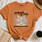 "A Book A Day Keeps Reality Away" T-Shirt | Cryptid Campfire Book Lover Graphic Tee & Fantasy Reader Shirt