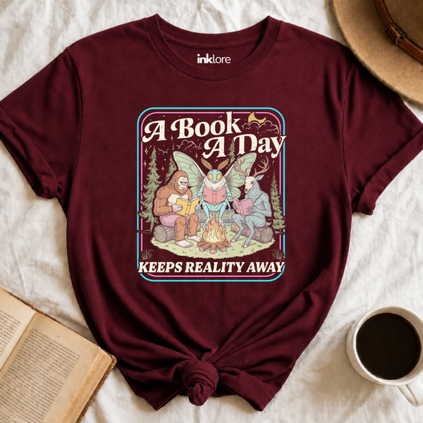 "A Book A Day Keeps Reality Away" T-Shirt | Cryptid Campfire Book Lover Graphic Tee & Fantasy Reader Shirt