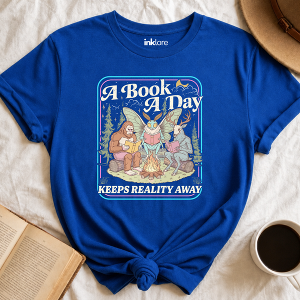 "A Book A Day Keeps Reality Away" T-Shirt | Cryptid Campfire Book Lover Graphic Tee & Fantasy Reader Shirt