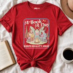 "A Book A Day Keeps Reality Away" T-Shirt | Cryptid Campfire Book Lover Graphic Tee & Fantasy Reader Shirt