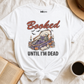 "Booked Until I'm Dead" Skeleton T-Shirt | Funny Spooky Book Lover Graphic Tee & Goth Reading Shirt