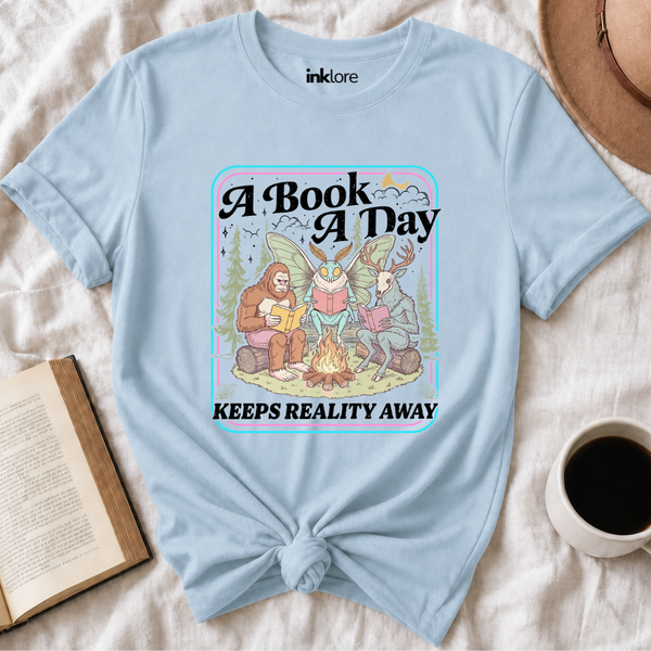"A Book A Day Keeps Reality Away" T-Shirt | Cryptid Campfire Book Lover Graphic Tee & Fantasy Reader Shirt
