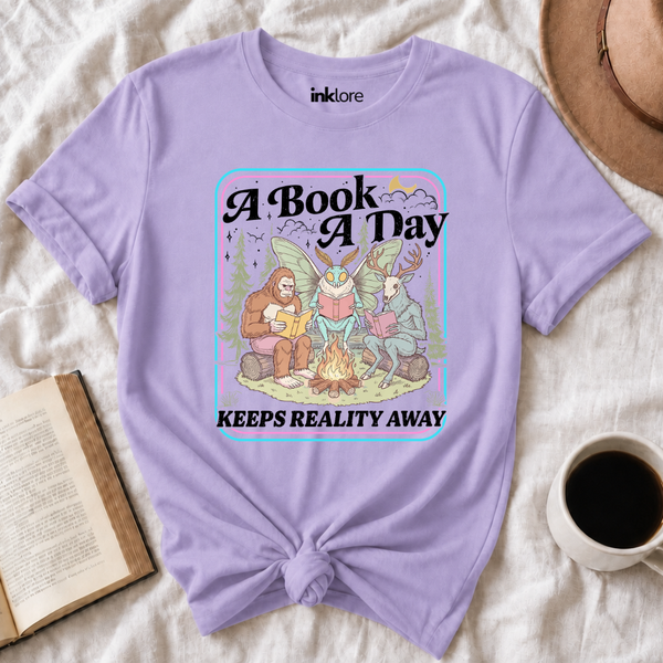 "A Book A Day Keeps Reality Away" T-Shirt | Cryptid Campfire Book Lover Graphic Tee & Fantasy Reader Shirt